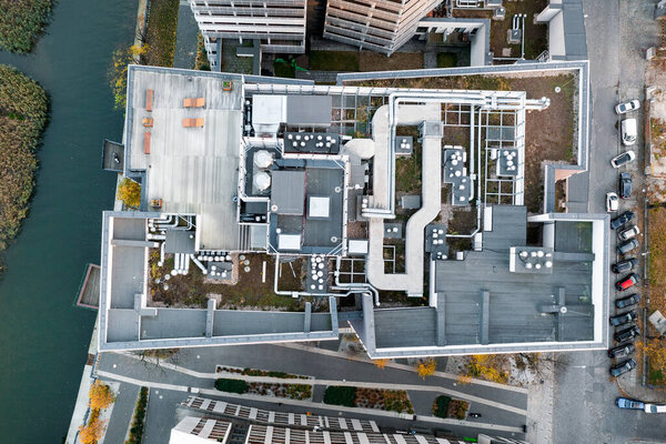 Ventilation air conditioning system on the roof of the building. Industrial ventilation and air conditioning system. Multi-storey building, view from above