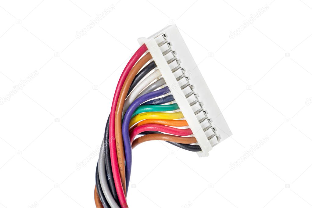 Connector for computer power supply with colored wires. On a white isolated background, many multi-colored wires from the computer