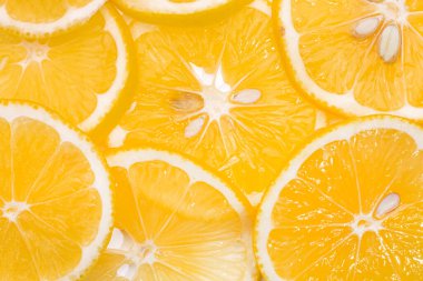 Bir sürü portakal dilimi, arka plan için dilimlenmiş portakal.