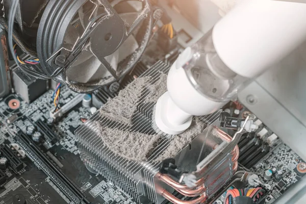 Cleaning the radiator in the computer system unit, removing dirt in the computer, overheating the computer