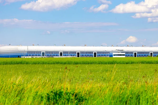 Logistics center against the blue sky, large logistics center