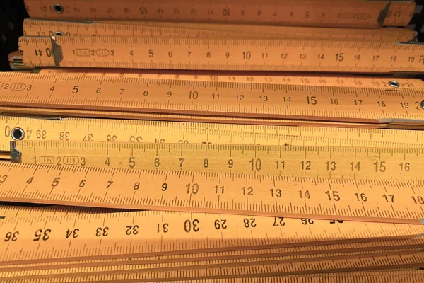 carpenter\'s ruler, many folding wooden rulers for carpenters