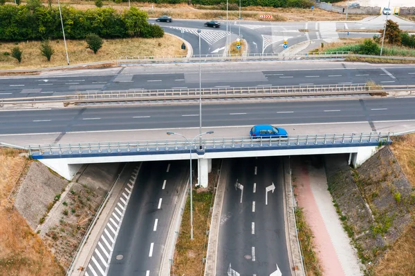 Fork in the highway, passing the bridge on the highway