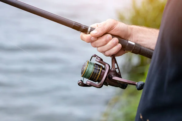 Man Hand Holding Fishing Rod Fishing – stockfoto