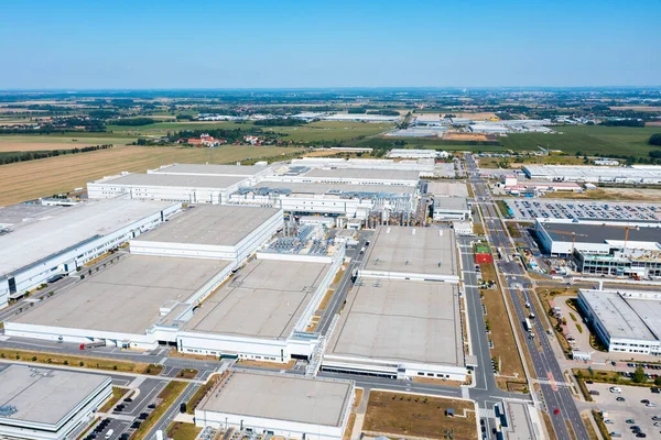 Aerial view of a large factory with many electronics production buildings, electronics factory