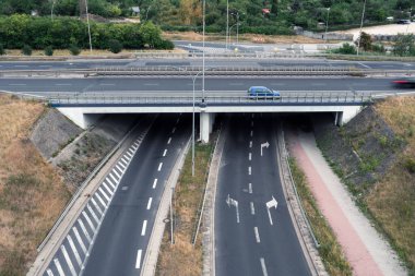 Fork in the highway, passing the bridge on the highway
