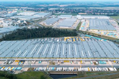 Aerial view of truck loading in logistics warehouse