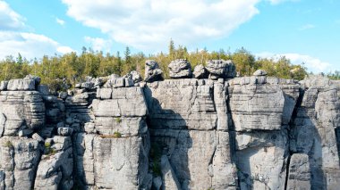 Large rocky mountains against the blue sky, a landscape in the mountains from a height
