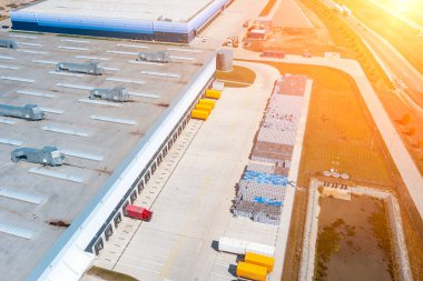 Aerial view of logistics warehouses, transportation of goods by land transport