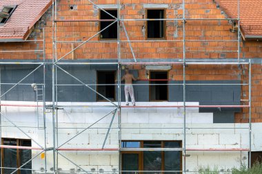 Insulation of the house with foam plastic, insulation of the house, repair work