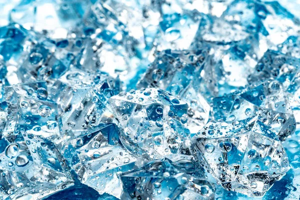 Ice cubes on blue background Stock Picture