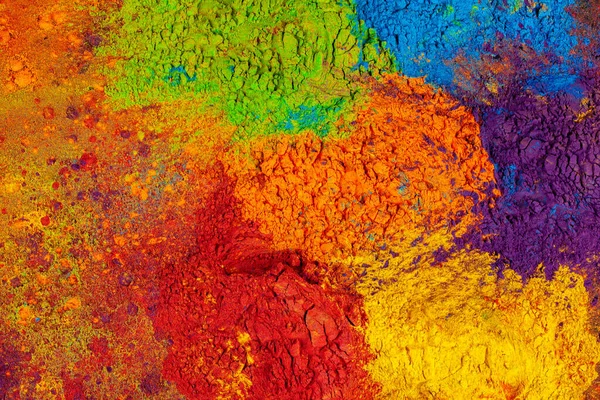 Kleurrijke achtergrond gemaakt van Indiase kleurrijke kleurstoffen — Stockfoto