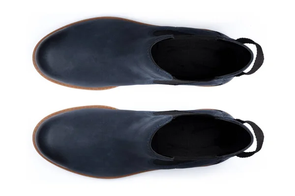 Οι μπότες απομονώθηκαν σε λευκό φόντο. Κορυφαία προβολή. — Φωτογραφία Αρχείου