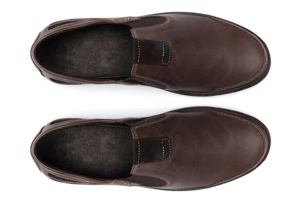 Zapatos clásicos de cuero masculino aislados en una vista superior blanca . — Foto de Stock