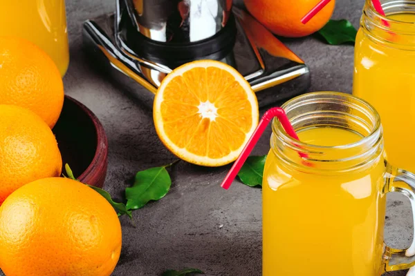 Orange juicer apparatus on kitchen table close up — Stock Photo, Image