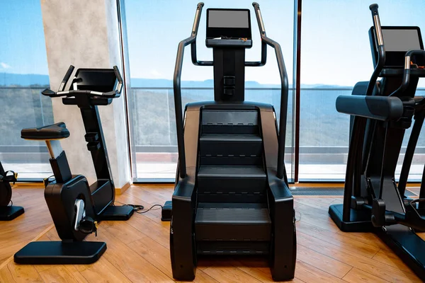 Modern gym interior with new fitness equipment — Stock Photo, Image