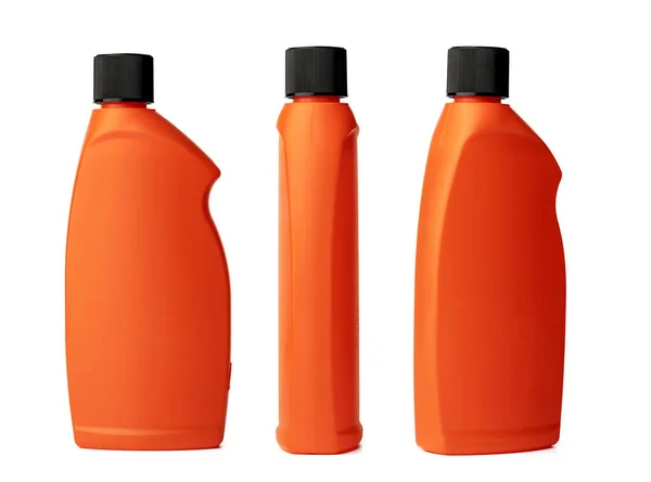 Botella de plástico naranja de detergente líquido aislado en blanco —  Fotos de Stock