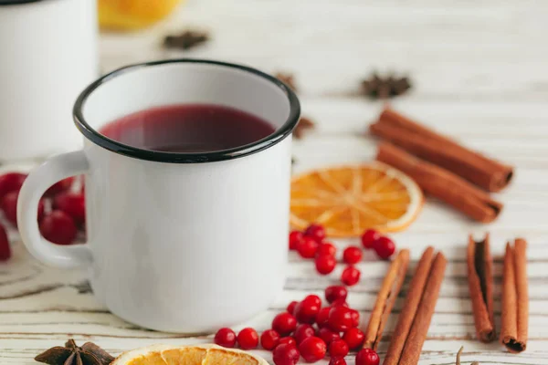 Autumn composition with hot mulled wine and spices on wooden background — Stock Photo, Image