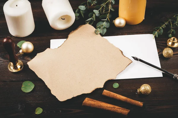 Writing Christmas post on holiday wooden decorated background — Stock Photo, Image