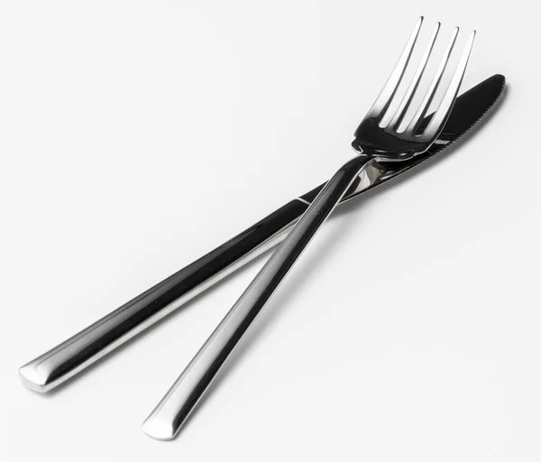 Tenedor y cuchillo aislados sobre fondo blanco — Foto de Stock