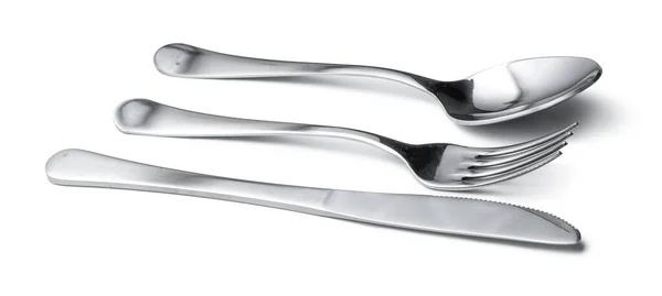Cuchara, cuchillo y tenedor aislados sobre fondo blanco — Foto de Stock
