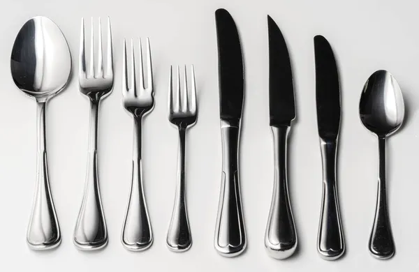 Set of silver cutlery on a white background — Stock Photo, Image