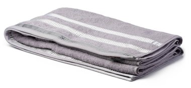 Beyaz arkaplanda izole edilmiş yumuşak katlanmış havlu