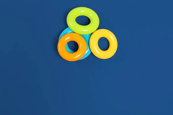 Plastic colorful circles children toys, top view — Stock Photo, Image