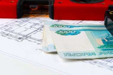 Mimari çizim ve Rus Rublesi para yığını