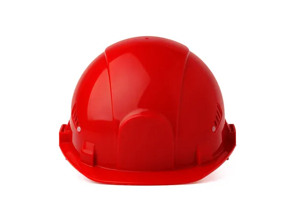 Czerwony plastikowy twardy kapelusz bezpieczeństwa izolowany na białym tle — Zdjęcie stockowe