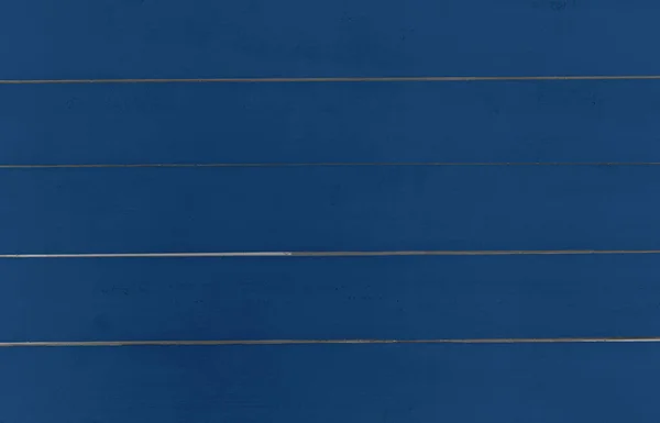 Dunkelklassisch blauer Holzhintergrund aus Planken — Stockfoto