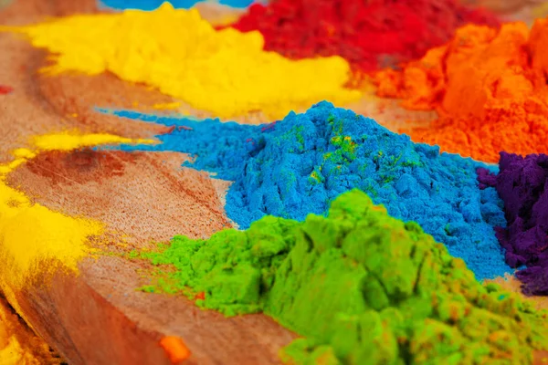 Um monte de cores colocadas sobre fundo de madeira fechar — Fotografia de Stock