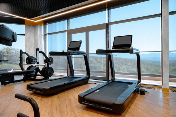 Studio shot of a professional treadmill in modern gym — Stock Photo, Image