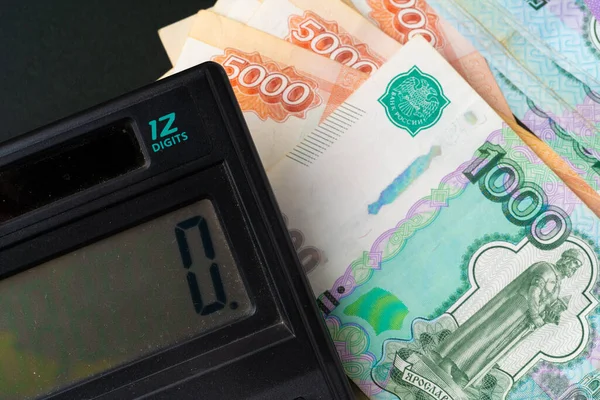 Close up photo of stack of Russian money rubles with calculator — Stock Photo, Image