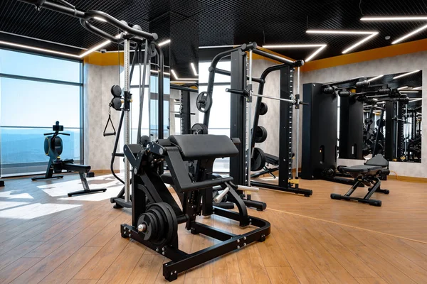 Modern gym interior with new fitness equipment — Stock Photo, Image