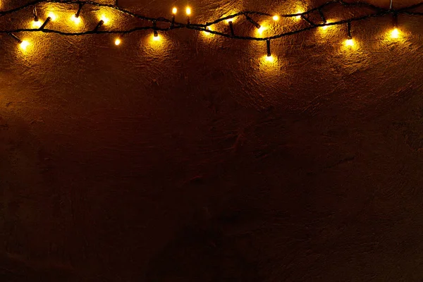 Astratto Natale luci ghirlanda su sfondo scuro — Foto Stock