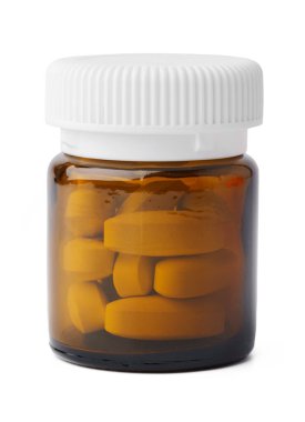 Beyaz arka planda kahverengi cam ilaç şişesi