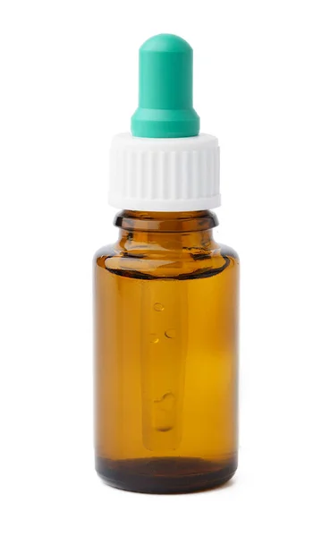 Frascos con aceite esencial aislado sobre fondo blanco — Foto de Stock