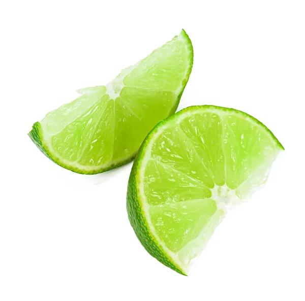 Pieces of lime isolated on white background — Stock Photo, Image