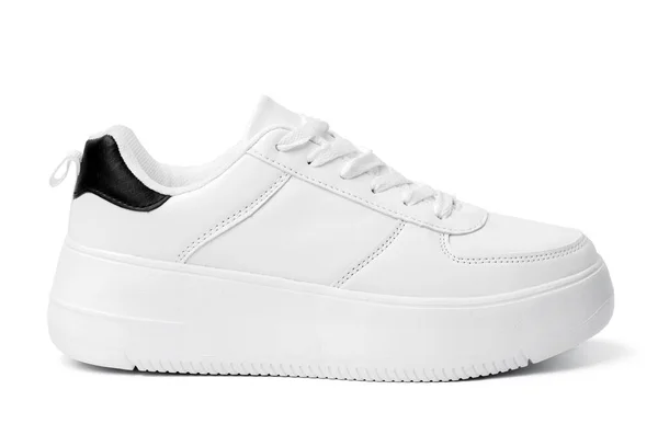 Een witte sneaker schoen geïsoleerd op wit — Stockfoto