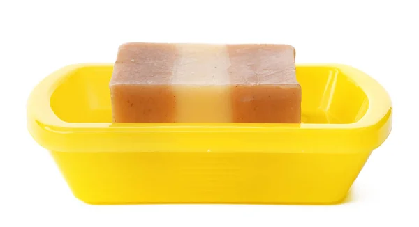 Soap on a plastic soap dish isolated on a white background — 图库照片