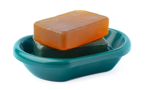 Soap on a plastic soap dish isolated on a white background — 图库照片