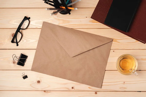 Letters and Office Supplies on Table Desk. Top View — Stock Photo, Image