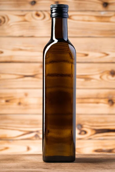 Blanco glazen fles met olijfolie, close up Stockfoto
