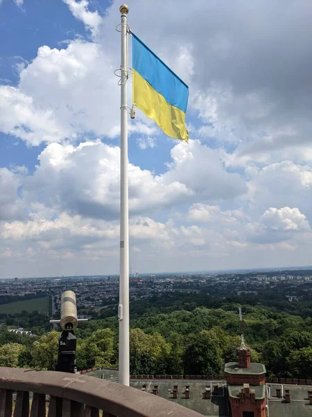 Flag of Ukraine on the viewing platform of Kociuszko Mound, Krakow, Poland