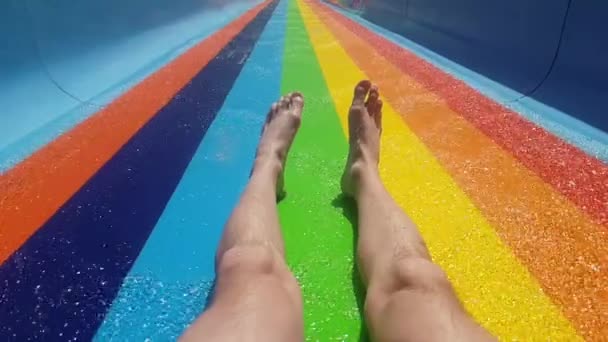 First Person View Men Legs Rainbow Water Slide Water Park — Stock Video