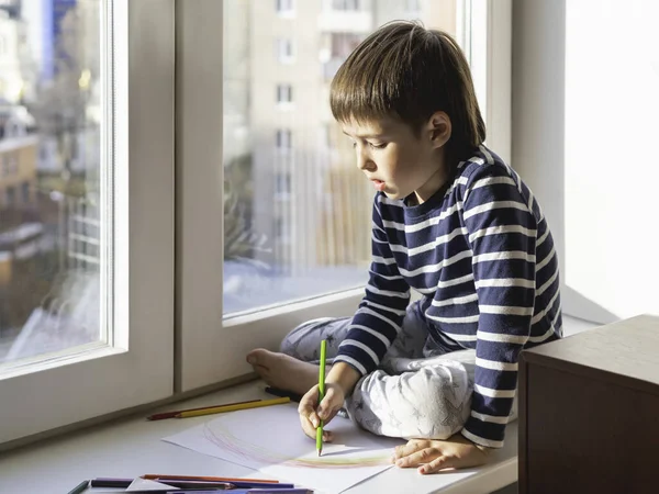 Little Boy Sits Window Sill Draws Rainbow Colored Pencils Creative — Stock Photo, Image