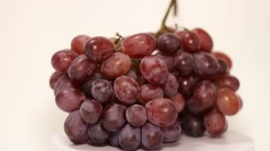 Close-up of grapes on a rotating tray