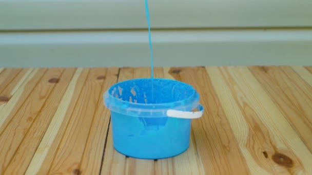 Blue Paint Poured Bucket — Stockvideo
