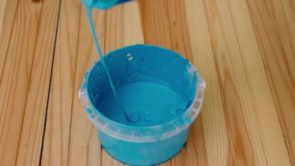Blue Paint Poured Bucket — Stockvideo